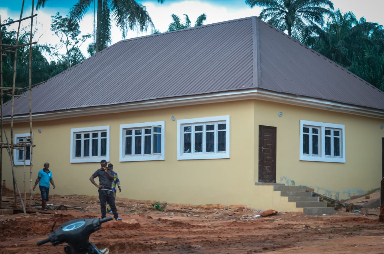 Doctor examines the patient's pulse with stethoscope and records the results, health medical checkup