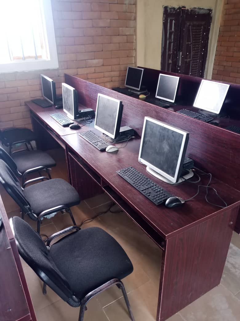 Young students painting on canvas during lesson in faculty of arts